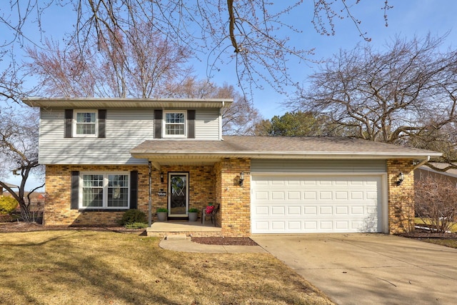 traditional-style home with concrete driveway, an attached garage, brick siding, and a front lawn