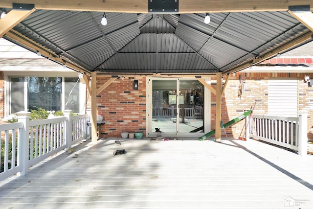 wooden terrace with a gazebo