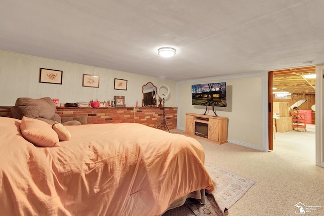 bedroom with baseboards and carpet flooring