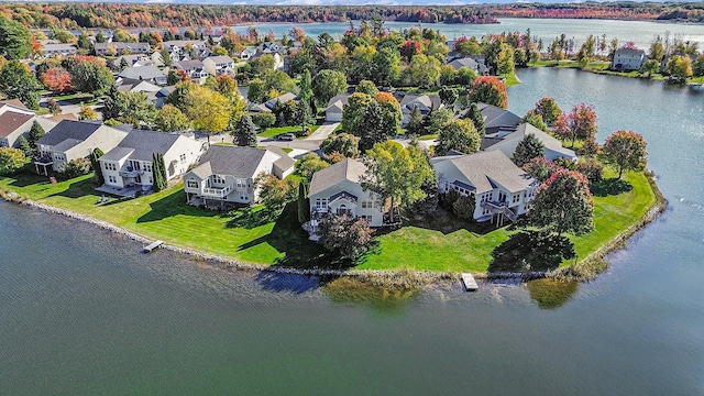 aerial view featuring a residential view and a water view