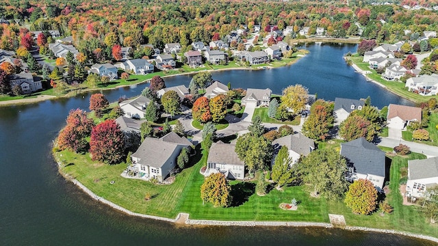 birds eye view of property with a residential view and a water view