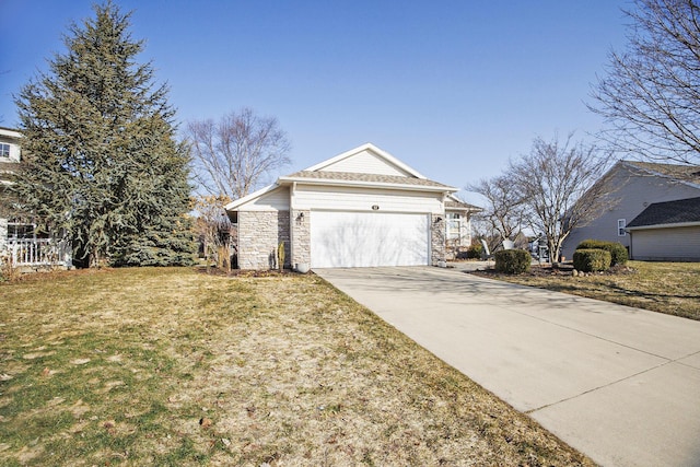 view of front of home featuring a front lawn, a garage, stone siding, and driveway