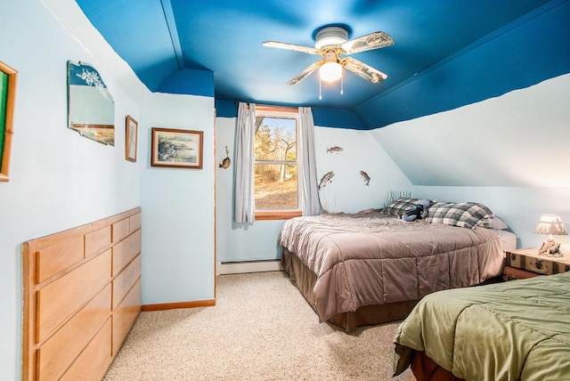 bedroom with a baseboard heating unit, lofted ceiling, light colored carpet, and baseboards