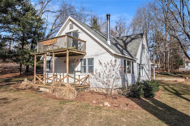 50172 Cable Lakeview Dr, Dowagiac, MI 49047 - view of side of home featuring a porch, a shingled roof, and a yard