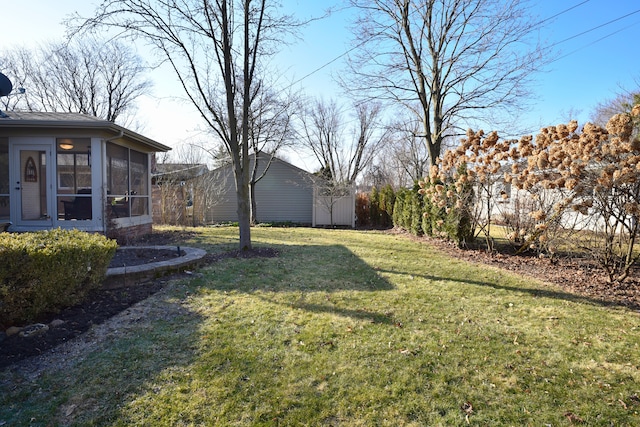 view of yard with a sunroom