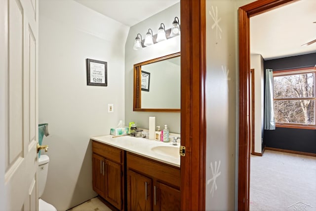 half bath with toilet and vanity