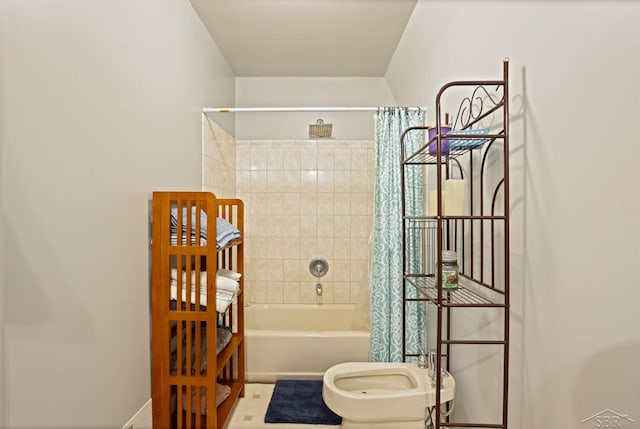 full bathroom featuring shower / bathtub combination with curtain and a bidet