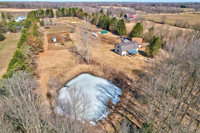 birds eye view of property featuring a rural view