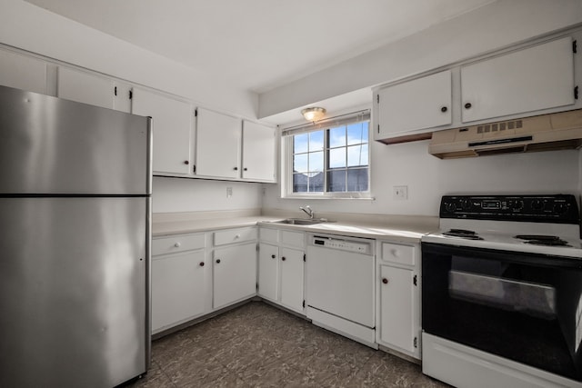 kitchen featuring range hood, white dishwasher, freestanding refrigerator, a sink, and range with electric stovetop