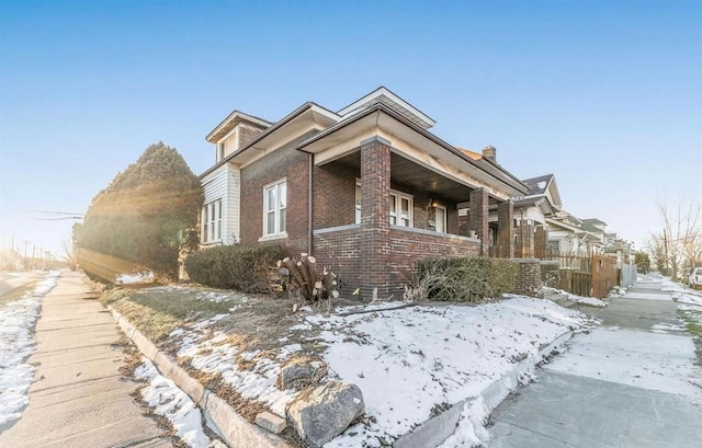 view of front of house with brick siding