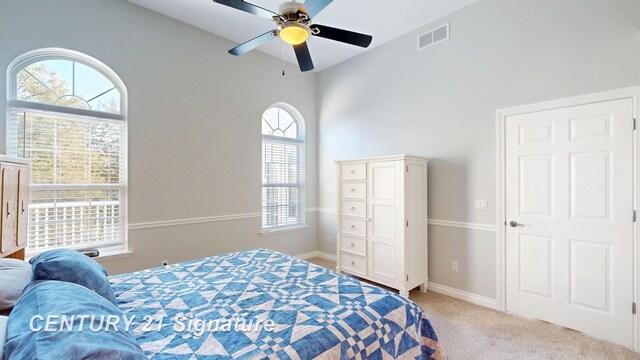 bedroom featuring a ceiling fan, carpet, visible vents, and baseboards