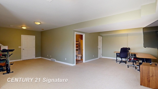 home office with visible vents, carpet floors, and baseboards