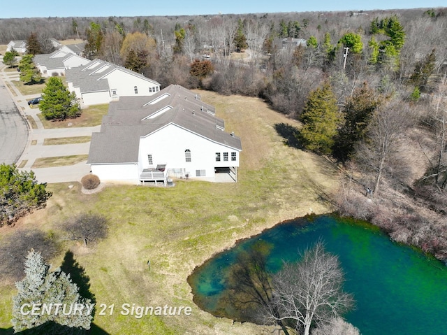 drone / aerial view featuring a view of trees