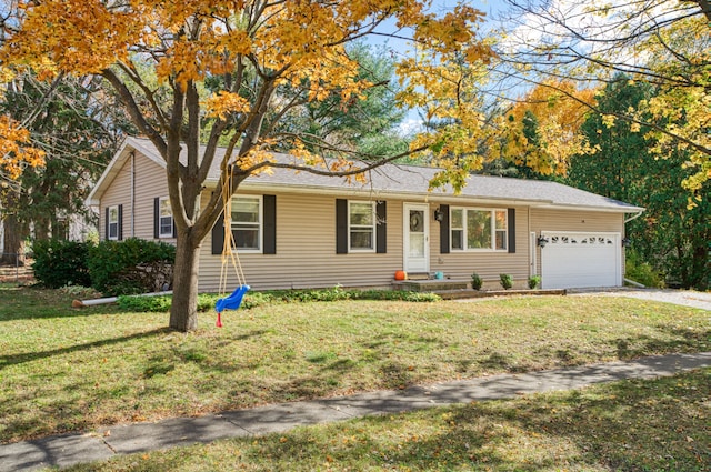 ranch-style house with a front lawn, concrete driveway, and a garage