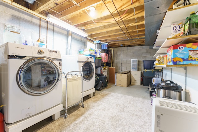 laundry room with laundry area and washing machine and dryer