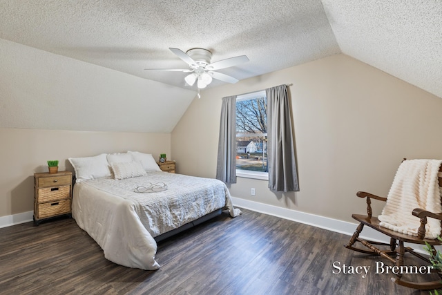 bedroom with lofted ceiling, a ceiling fan, a textured ceiling, baseboards, and dark wood-style flooring