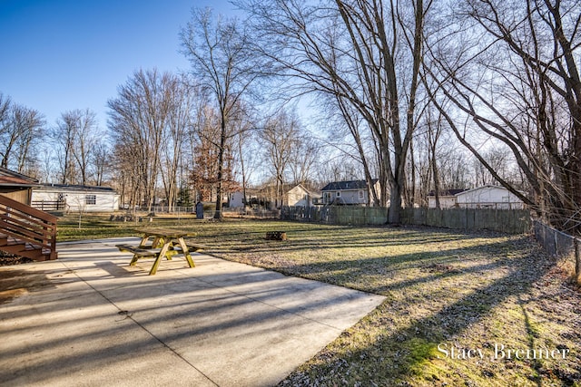 view of yard featuring a patio and fence private yard