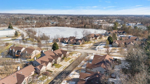 birds eye view of property with a residential view