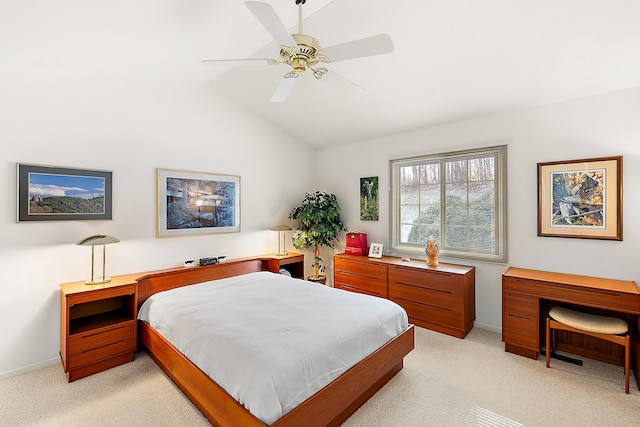 bedroom with light carpet, baseboards, ceiling fan, and vaulted ceiling