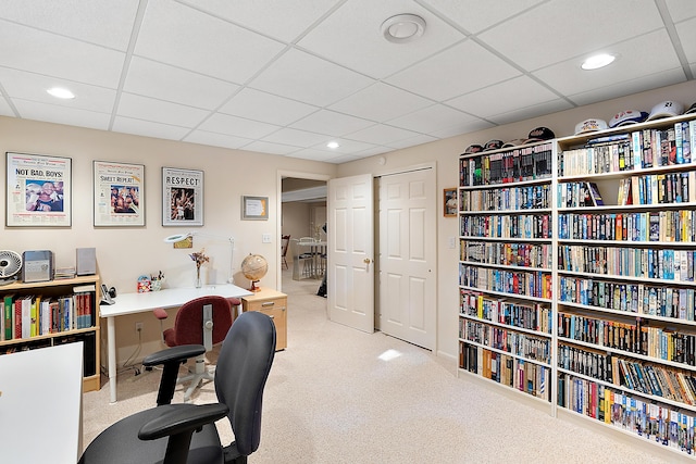 home office with recessed lighting, a paneled ceiling, and carpet