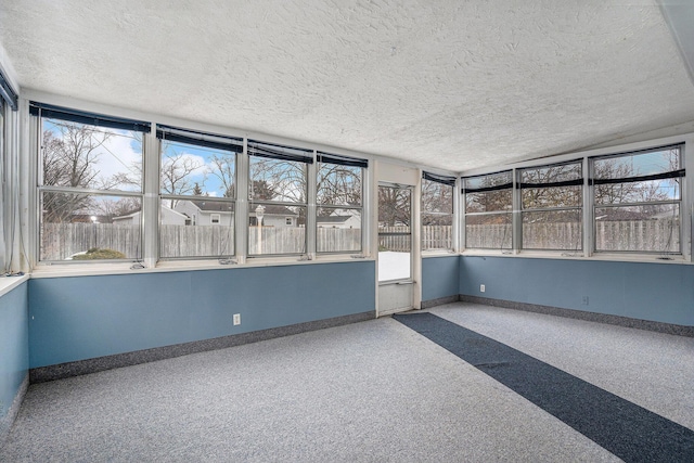 unfurnished sunroom with plenty of natural light