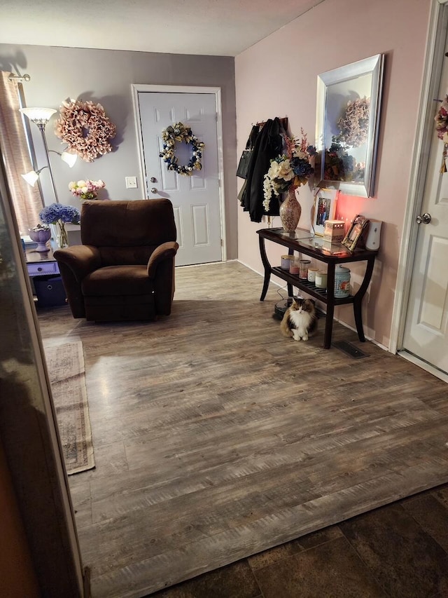 foyer with wood finished floors