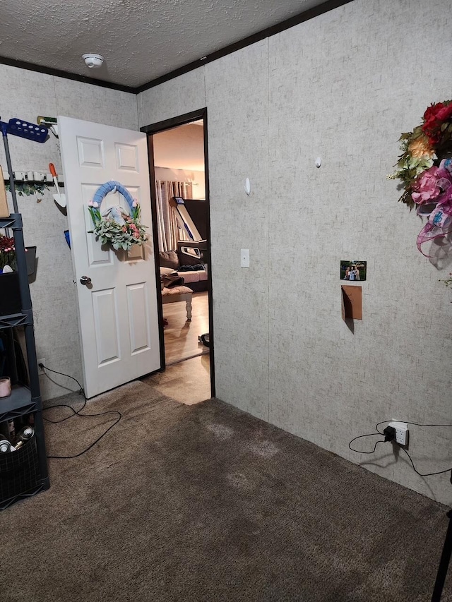 interior space featuring a textured ceiling