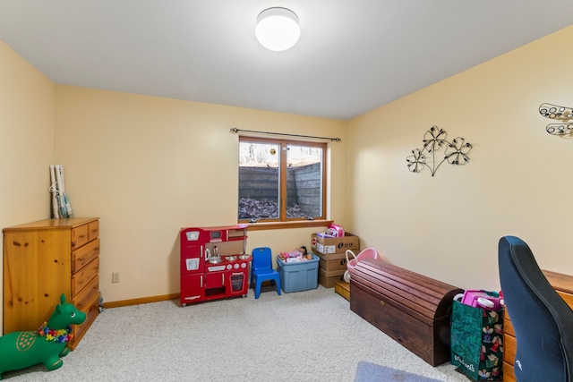 bedroom featuring carpet flooring and baseboards