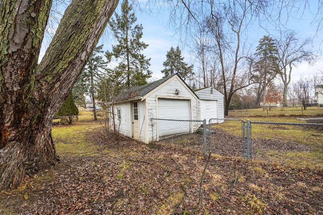 detached garage with fence