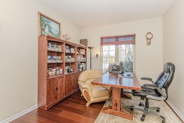 office featuring baseboards and dark wood-style flooring