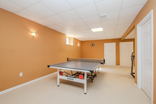 game room featuring a paneled ceiling, visible vents, carpet floors, and baseboards