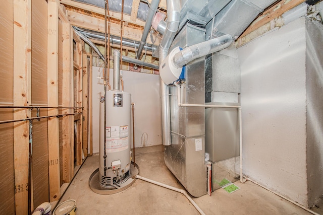 utility room featuring gas water heater