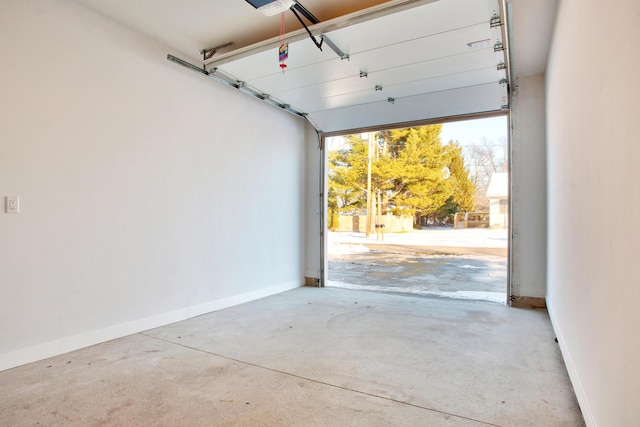 garage featuring baseboards