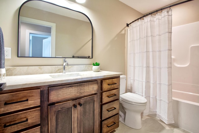 bathroom featuring vanity, toilet, and shower / bath combo with shower curtain