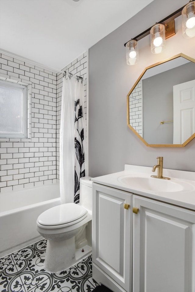 bathroom with shower / bath combo with shower curtain, toilet, vanity, and tile patterned flooring