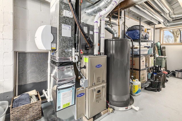 utility room featuring gas water heater