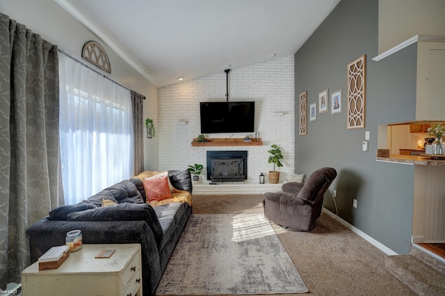 living room with carpet flooring, a fireplace, baseboards, and high vaulted ceiling