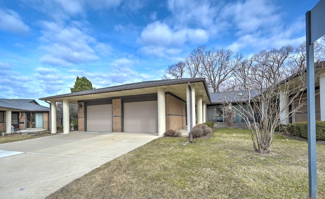 view of side of property featuring an attached garage, a lawn, brick siding, and driveway