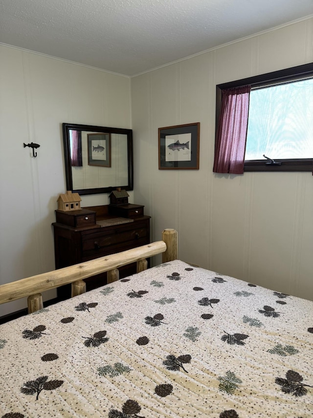 bedroom with a decorative wall