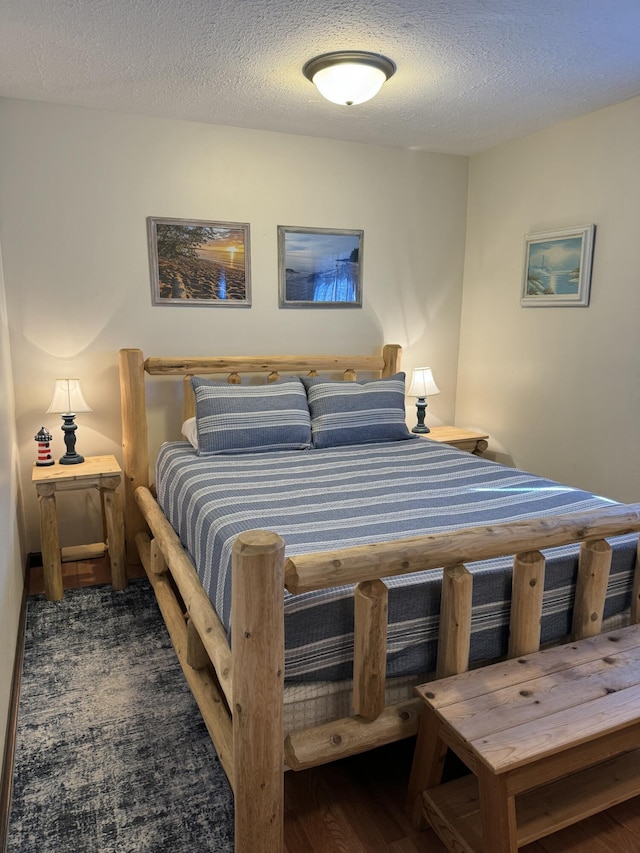 bedroom featuring a textured ceiling