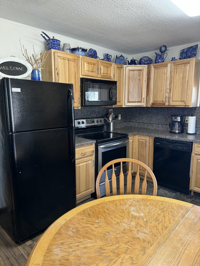 kitchen with black appliances, dark countertops, tasteful backsplash, and a textured ceiling