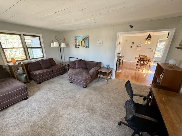 living room featuring wooden ceiling and wood finished floors