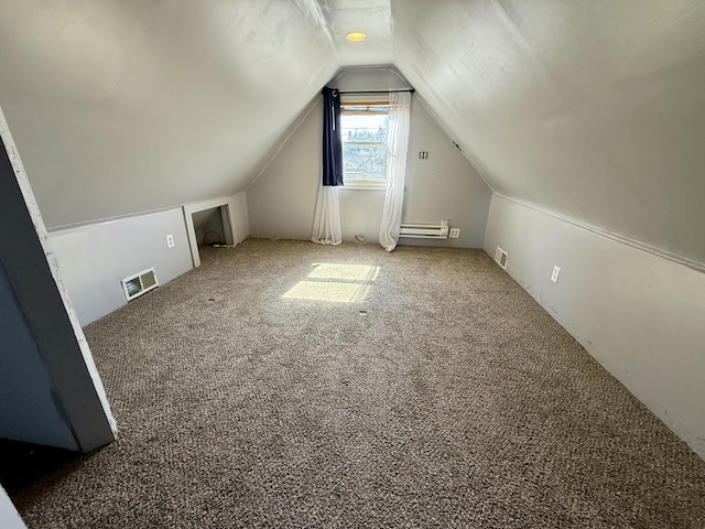 bonus room with lofted ceiling, visible vents, baseboard heating, and carpet floors