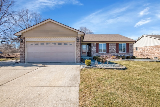 ranch-style home featuring concrete driveway, a garage, brick siding, and a front yard