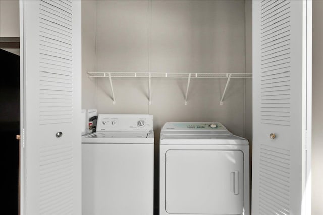 laundry room featuring laundry area and washer and clothes dryer