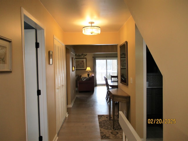 hall featuring wood finished floors