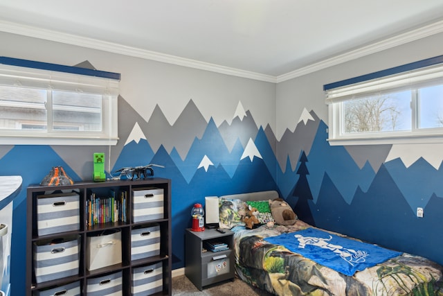 carpeted bedroom with an accent wall, baseboards, and ornamental molding