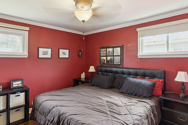 bedroom featuring a ceiling fan and crown molding