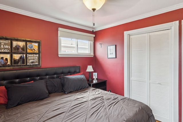 bedroom featuring a closet and ornamental molding