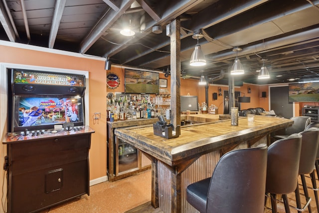 bar featuring a dry bar and baseboards